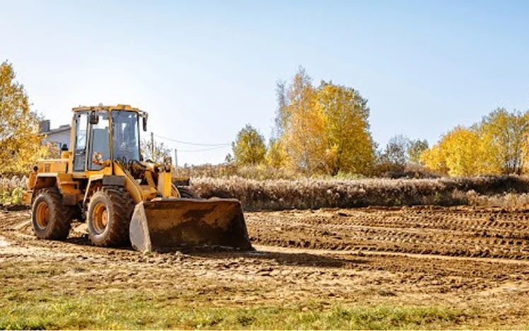 Wheel loader / tractor working on a job site