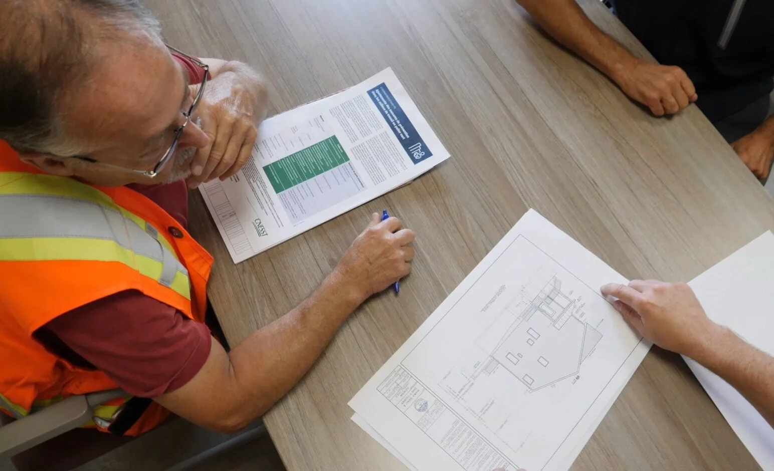 Reviewing construction plans on the job site